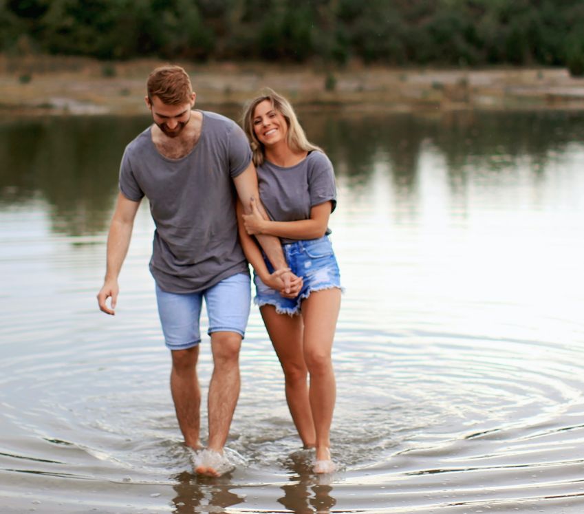 Couple standing in water
